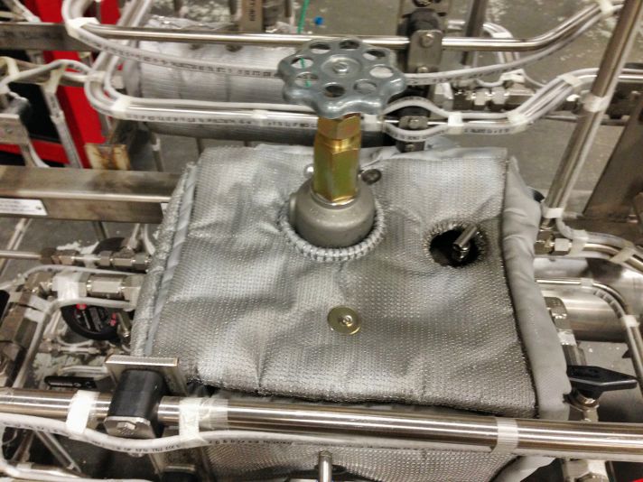 Stellar removable insulation covers fitted to valves and fittings at a plant site for process control — documented project 2